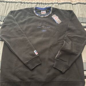Men's NFL x Staple Black Los Angeles Rams Globe Crewneck Pullover
